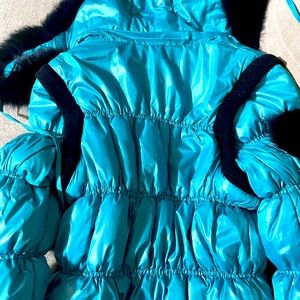 Very beautiful jacket,size M with nat fur, very hood conditions.